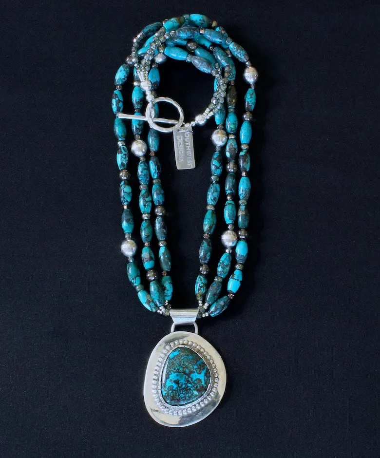 Chrysocolla-Malachite and Sterling Silver Pendant with 3 Strands of Turquoise Long Ovals, Bench-Made Sterling Silver Rounds, Czech Glass, Pyrite Nuggets and a Sterling Silver Toggle Clasp