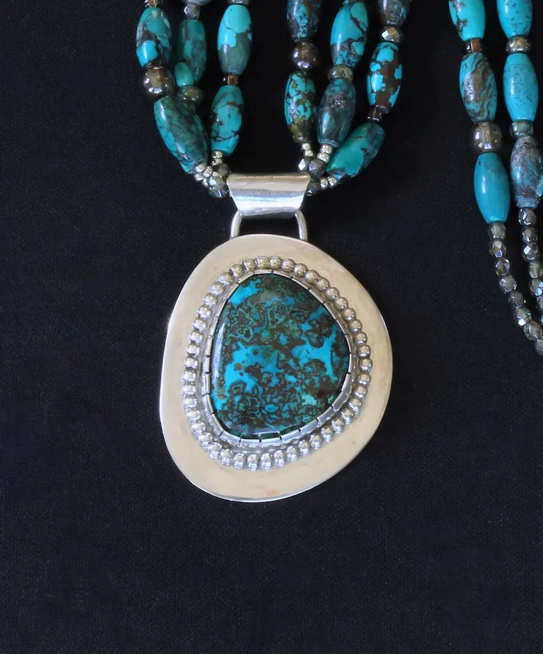 Chrysocolla-Malachite and Sterling Silver Pendant with 3 Strands of Turquoise Long Ovals, Bench-Made Sterling Silver Rounds, Czech Glass, Pyrite Nuggets and a Sterling Silver Toggle Clasp