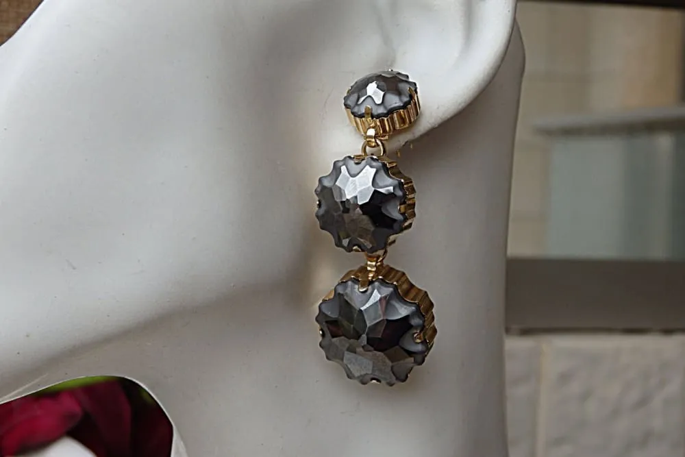 Dark grey earrings.