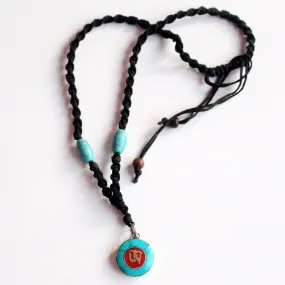 Round Turquoise Tibetan Om Pendant