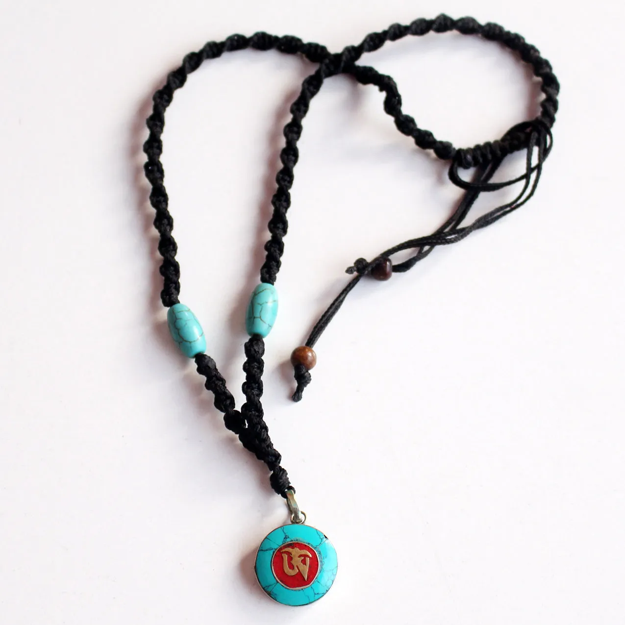 Round Turquoise Tibetan Om Pendant