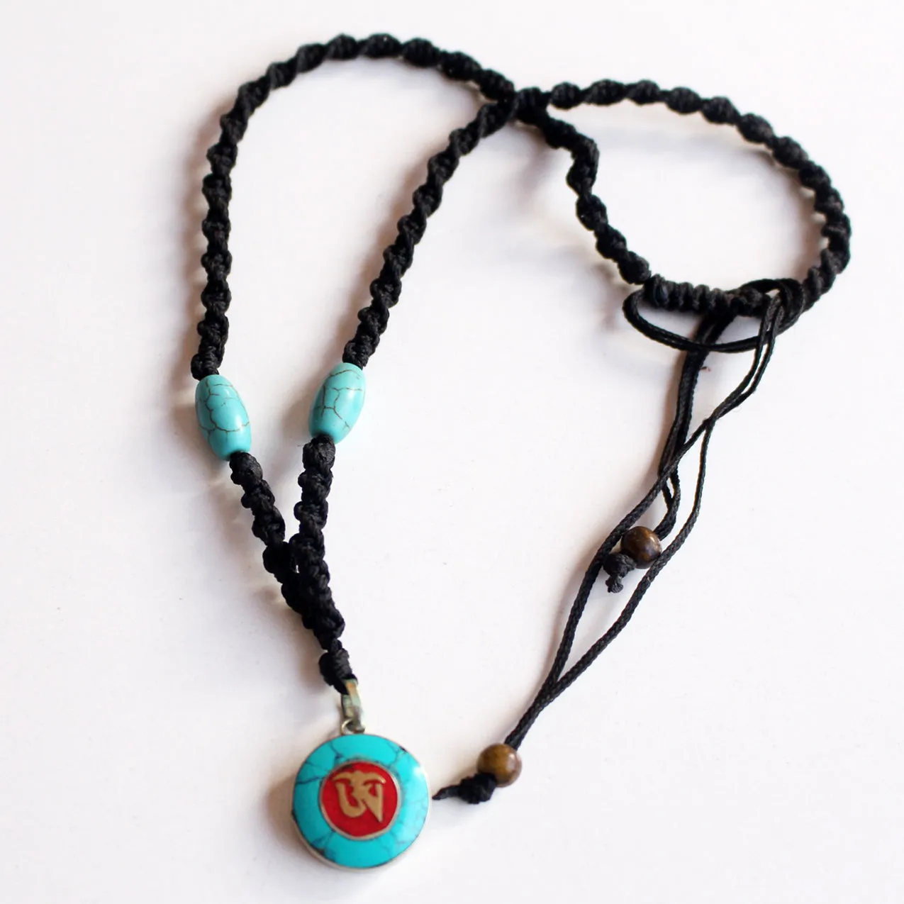 Round Turquoise Tibetan Om Pendant
