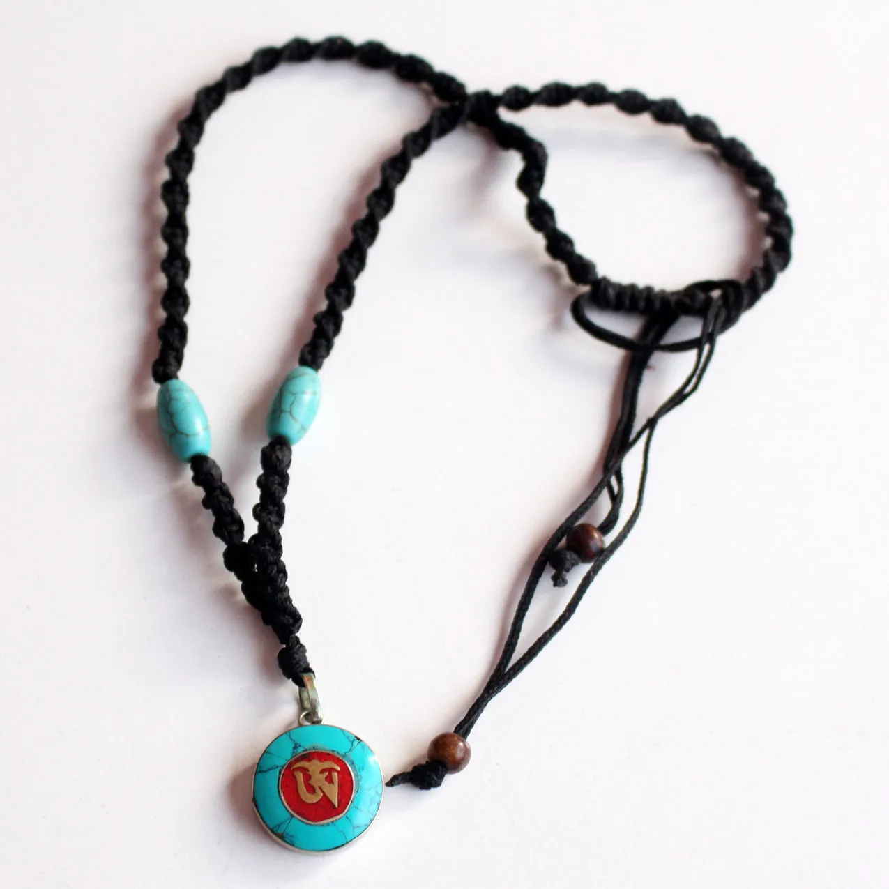 Round Turquoise Tibetan Om Pendant