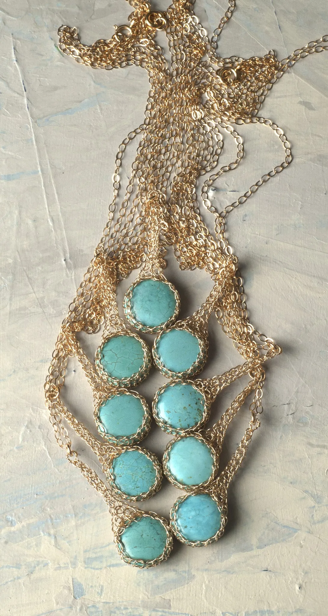Turquoise pendant necklace , small turquoise coin crocheted in gold